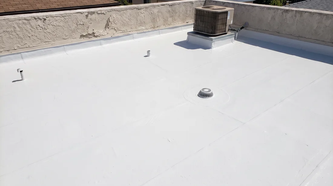 Flat roof silicone coating — after